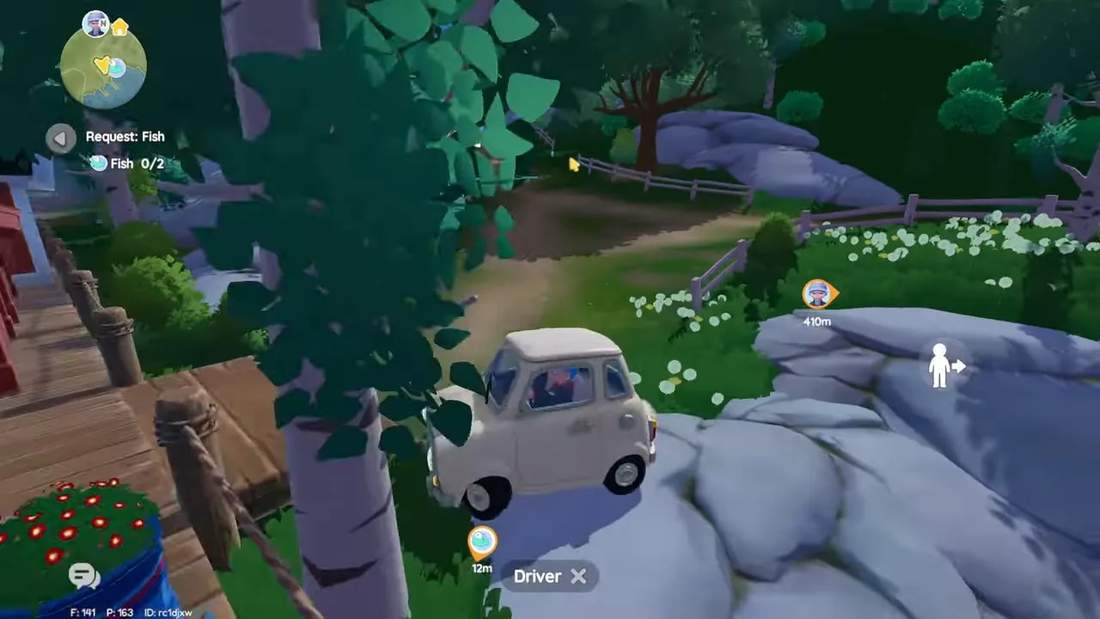 Car parked near the path and fence left of the docks with flowers and rocks visible