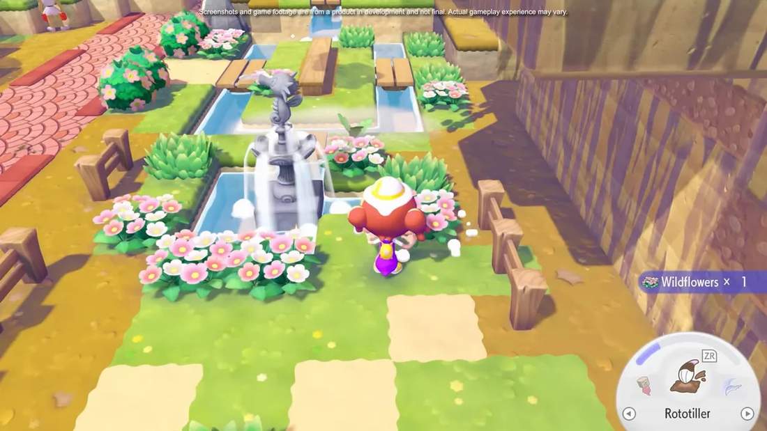 Top-down Pokopia view of a fountain surrounded by flowers, water channels and grassy tiles