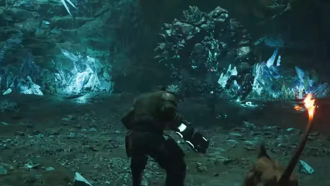 Final Fantasy VII Rebirth style combat in a crystal cave, party member facing a rocky enemy