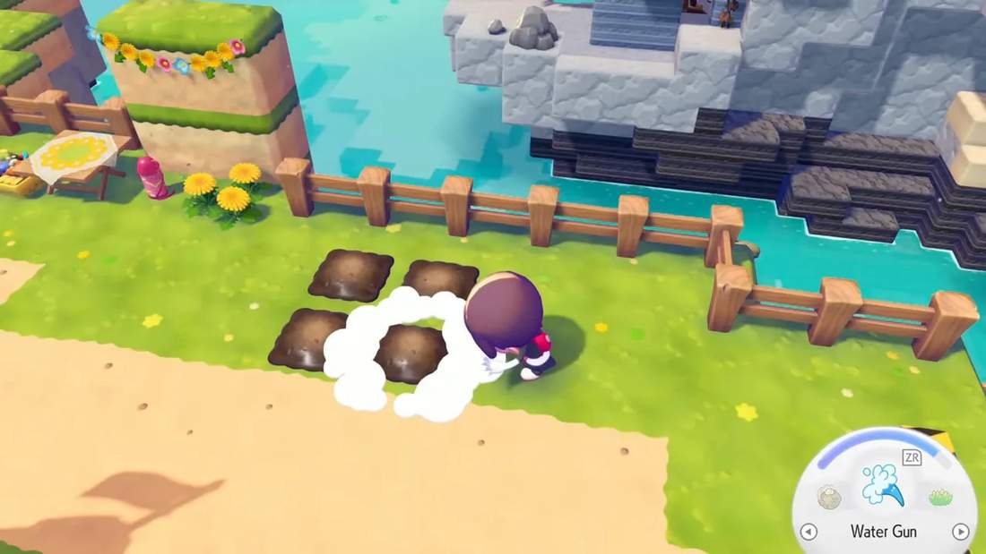 Player using a Grow/water effect on four planted flower clusters to complete a habitat