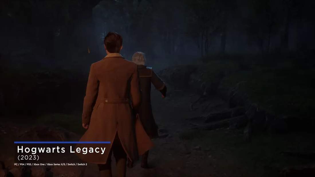 Player character walking down a dark forest path toward Hogwarts in Hogwarts Legacy