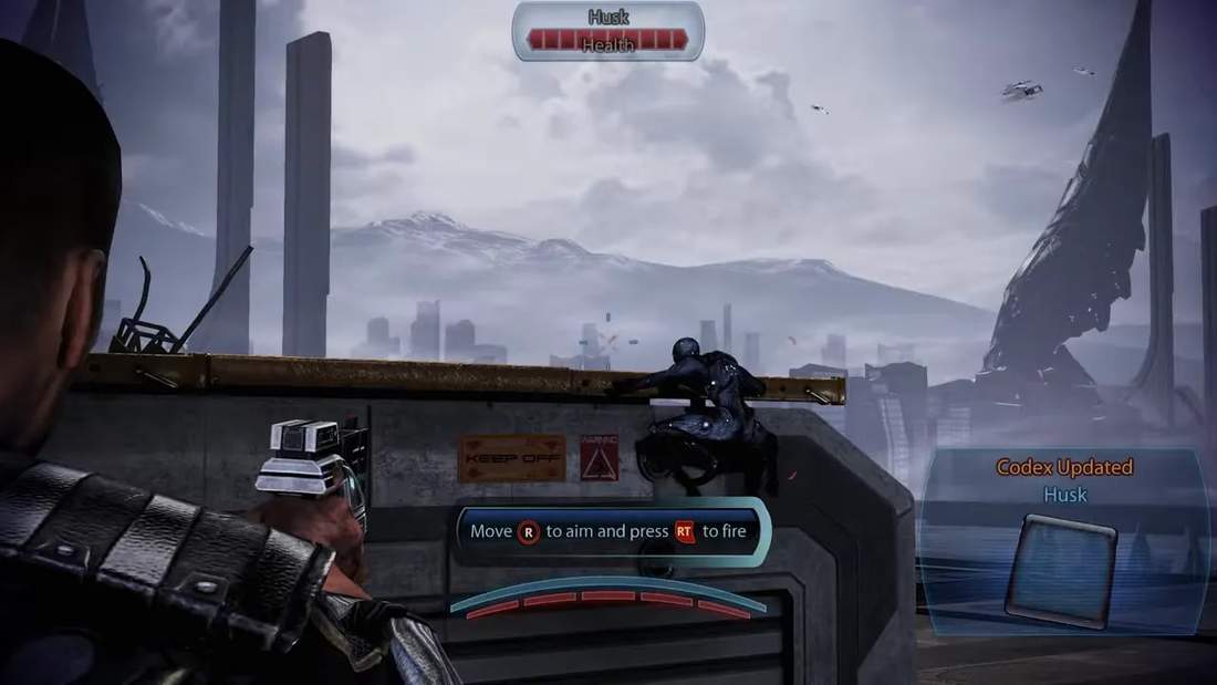 Mass Effect Legendary Edition outdoor combat with Husks in view and combat HUD health and codex prompt