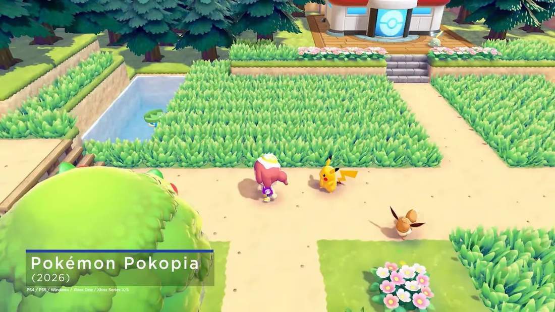 Overhead gameplay of Pok&eacute;mon Pokopia showing the player with Pikachu and Eevee near a Pok&eacute;mon Center and tall grass