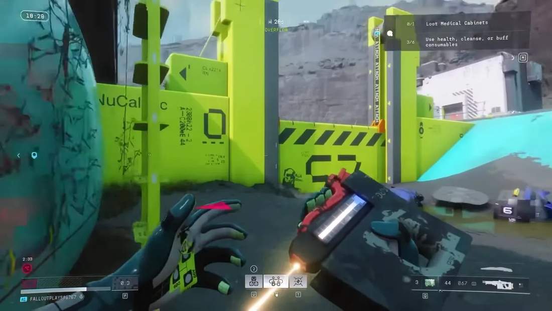 Player holding a device near bright yellow map geometry and a gate in Marathon.