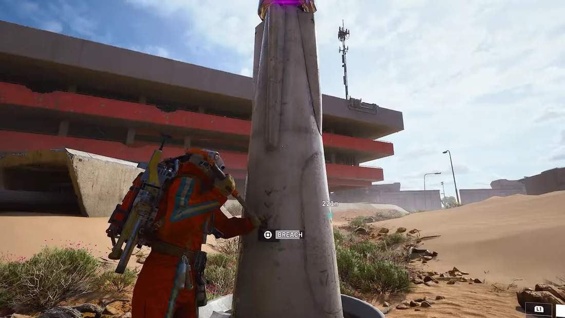 ARC Raiders character crouched behind cover with a HUD marker reading 221m while attempting a breach