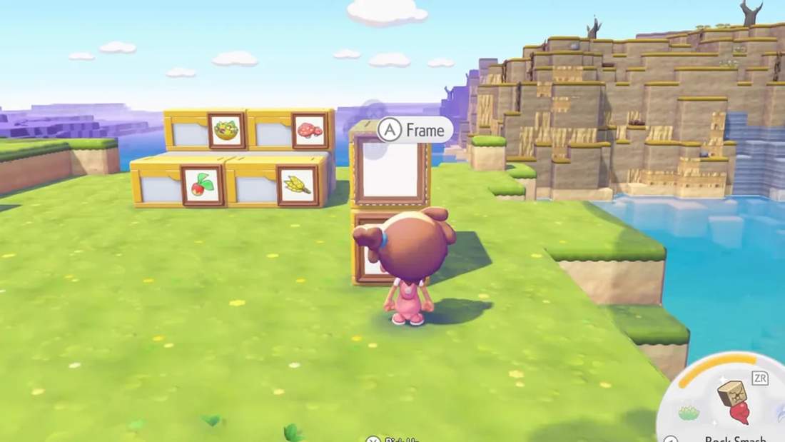 Pok&eacute;mon Pokopia frame interaction prompt over a front-mounted storage label