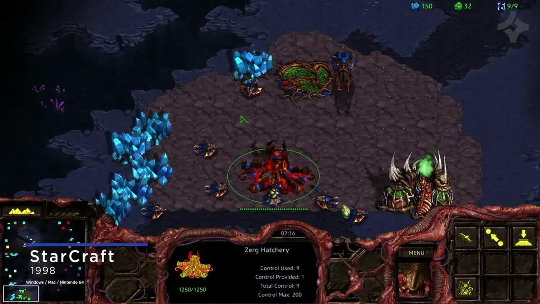 StarCraft gameplay screen with Zerg hatchery and units under control