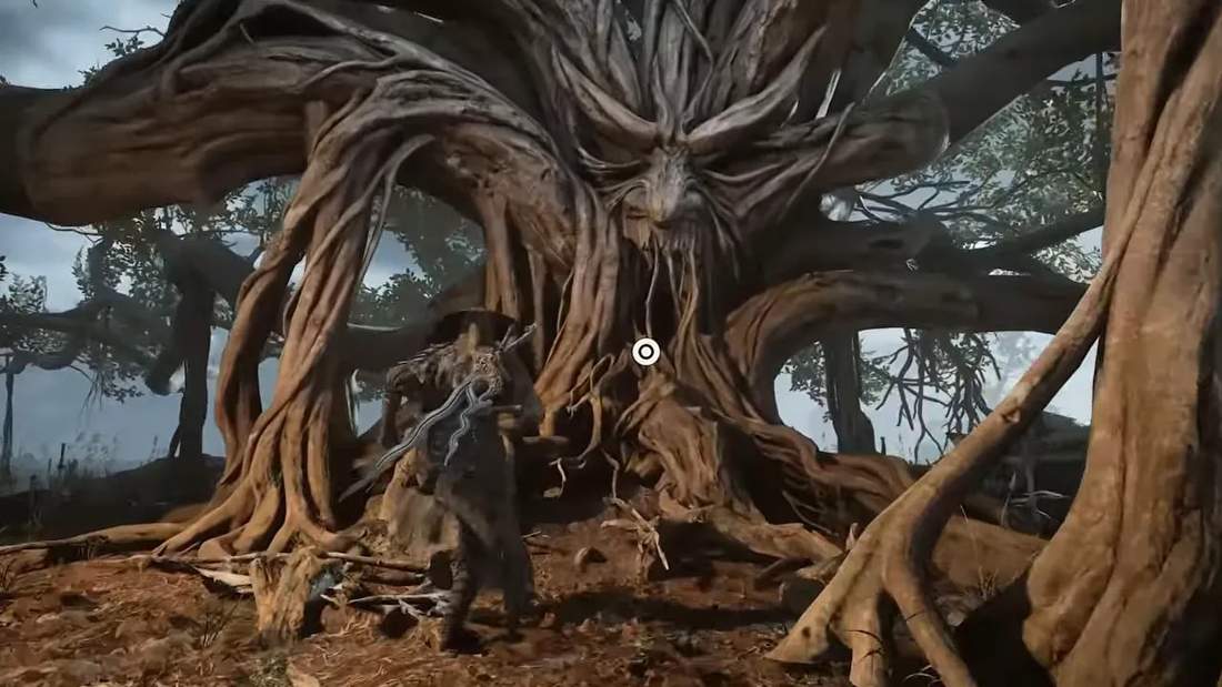 Character standing at the roots of a huge tree with a human-like face in its trunk